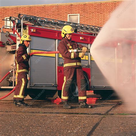 Firefighters Using Hose Stock Image T6640125 Science Photo Library