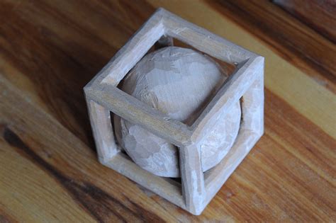 A Ball In A Cube Shaped Cage Woodcarving