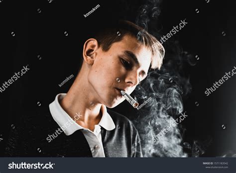 Teenage Boy Smoking Cigarette Rolled Dollar Stock Photo 1571183542