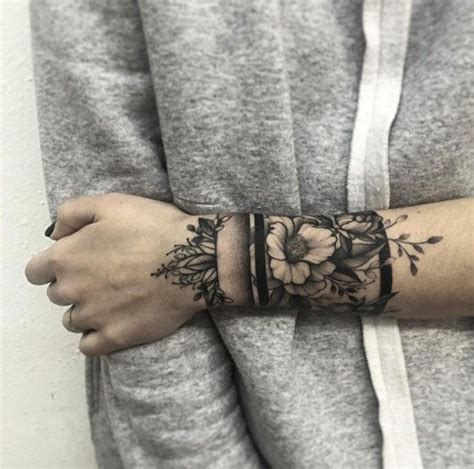 100 most captivating tattoo ideas for women with creative minds — tattoos on women — cuff