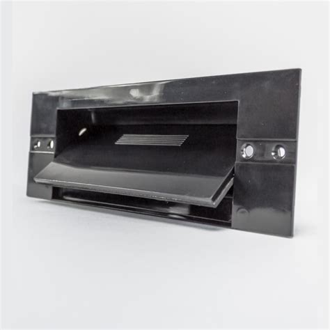 They complement the dark countertops and, since the black kind of fades into the background, the cabinets appear to hover just above the floor. Black Toe Kick Dustpan | Custom Vacuum Systems