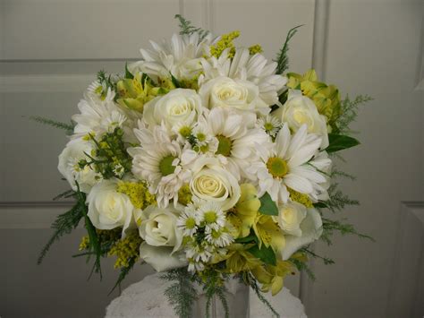 Danisa is a leading supplier of wholesale flowers, bulk wedding flowers, roses in dc area. Bride bouquet of white roses, white daisies, yellow ...