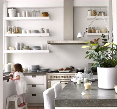 Hang them in kitchens, bedrooms, and living areas to stow necessities or exhibit favorite finds and artwork. natural modern interiors: Open Kitchen Shelves Ideas