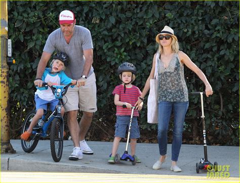 Naomi Watts And Liev Schreiber Run After The Kids At The Park Photo