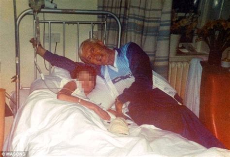 Jimmy Savile Pictured Perched On Stoke Mandeville Hospital Bedsides Daily Mail Online