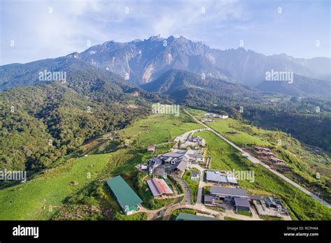 Aerial View Of Kundasang Sabah Landscape And Mount Kinabalu At Far