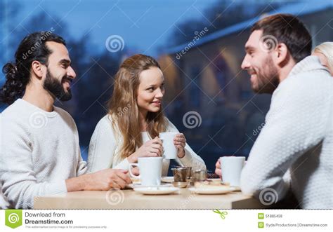 Happy Friends Meeting And Drinking Tea Or Coffee Stock Photo Image Of