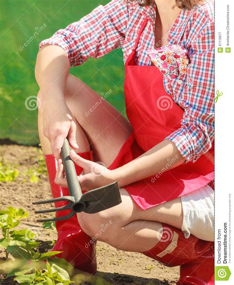 woman with gardening tool working in garden stock image image of adult farm 67119977