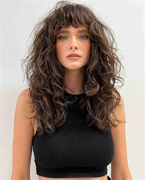 32 Ways To Pair Wavy Hair With Bangs For A Super Flattering Look