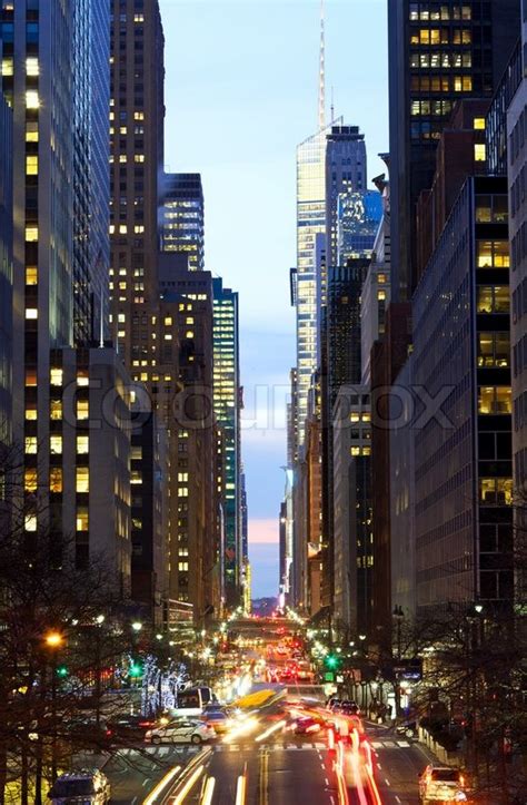 New York City Manhattan Street View With Busy Traffic At Dusk Stock