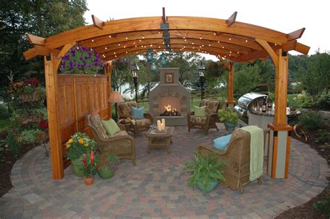 Outdoor Sitting Area With Fireplace Under Pergola Quite The Backyard