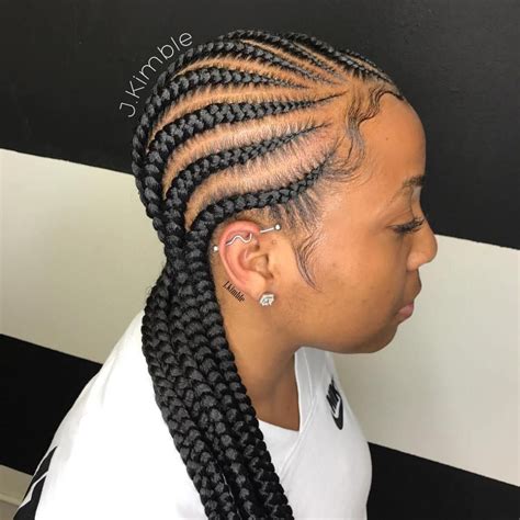 Start the braids and cornrows at the edge of the head and braid them up to eventually wind around a cute bun updo. 20 Super Hot Cornrow Braid Hairstyles | Cornrow hairstyles ...