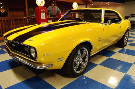What a beautiful car and very beautiful picture. 1968 Chevrolet Camaro - Yellow / Flat Black - A&E Classic Cars