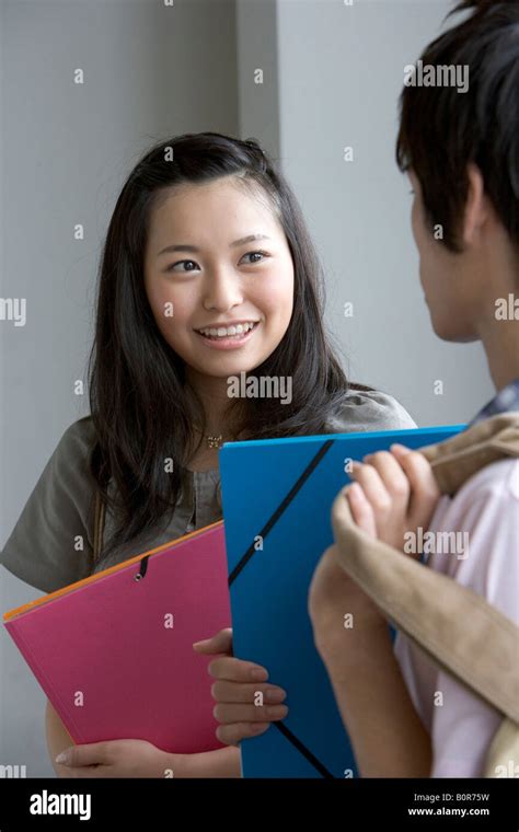 Two Students Talking Stock Photo Alamy