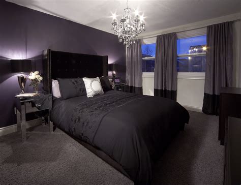Bedroom With Purple Feature Wall And Drapery Crystal Chandelier And