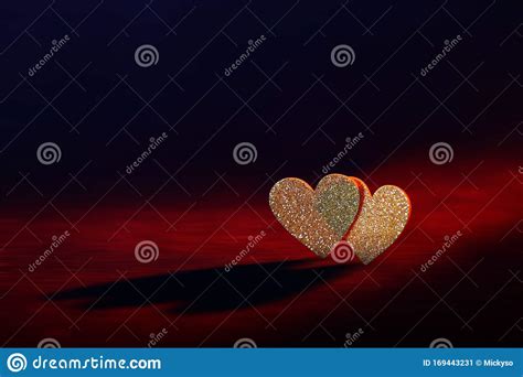 Two Glittering Hearts On A Glittery Red Background Stock Image Image
