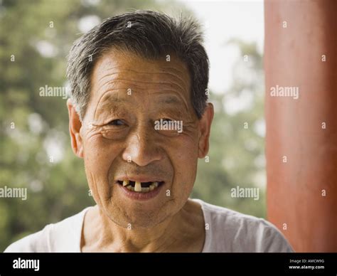 Portrait Of A Toothless Man Outdoors Smiling Stock Photo Alamy