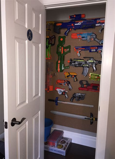We made this nerf gun cabinet with 2 ikea besta shelf frames. Pin on Store Your NERF Guns