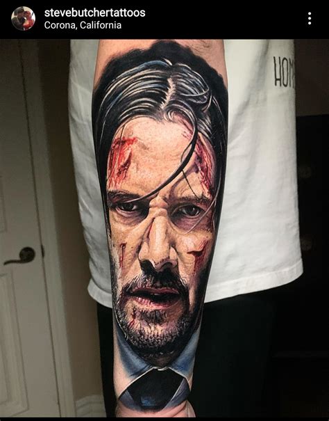 The fourth tattoo is a praying hand. John Wick Tattoo by Steve Butcher : KeanuBeingAwesome