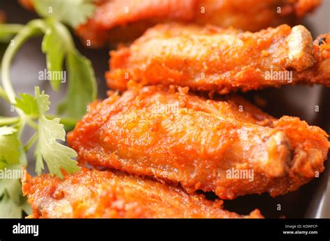 Close Up Spicy Deep Fried Breaded Chicken Wings With Ranch And