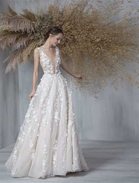 Sleeveless Deep V Neck Illusion Neckline A Line Wedding Dress