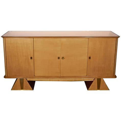 Cabinet components, floating shelves & surfaces • specialty veneer options: French Modernist Sycamore Cabinet with Pyramid Base For Sale at 1stdibs