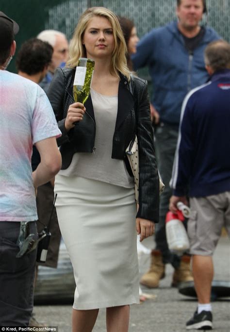 Kate Upton Downs A Bottle Of White Wine On Set Of The