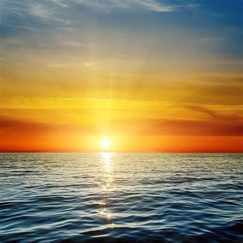Royalty Free Sunrise Over Water Pictures Images And Stock Photos Istock