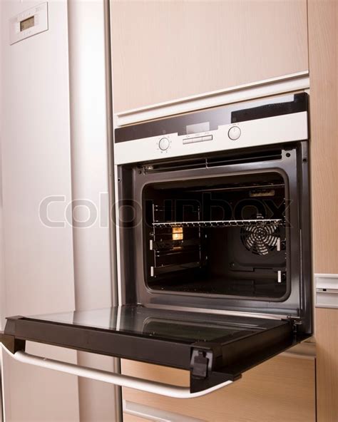 Side View Of An Open Oven Door Stock Image Colourbox