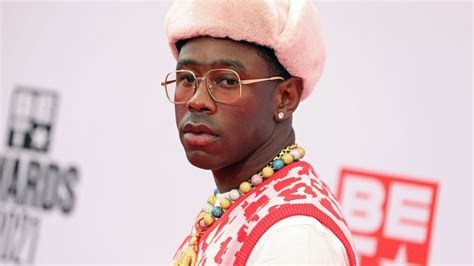 Tyler The Creator Is Wearing Red White Dress And Pink Cap Hd Tyler The Creator Wallpapers Hd