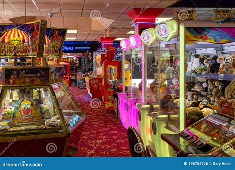 The Inside Of An Amusement Arcade With Grabber Machines Two Pence