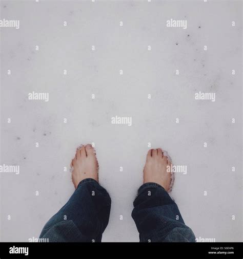 Bare Feet In Snow Stock Photo Alamy