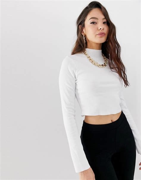 Asos Design Long Sleeve Crop Top With Turtleneck And Raw Hem In Rib In