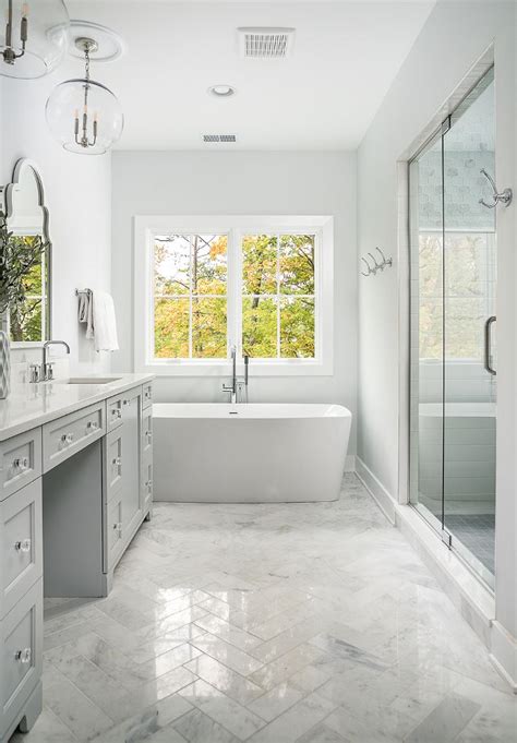 Clean white bathroom hexagon tiles, white subway tiles backsplash and soft green gray. Herringbone Marble Floor Tile Bathroom Marble Floor Tile ...