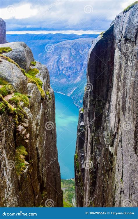 View Of Lysefjorden Through A Crevice Between Two Cliffs 984 Meters