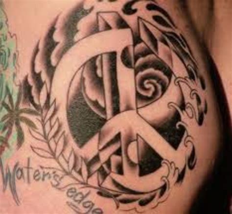 Another tattoo to honor grandpa, a spectacular design with detailed shading is a masterpiece. Peace Sign Tattoo And Peace Sign Tattoo Meanings-Peace ...