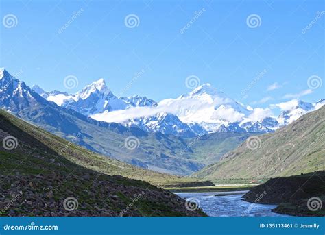 Jammu Kashmir Landscape With Snow Peaksgreen Valley And Blue Cloudy