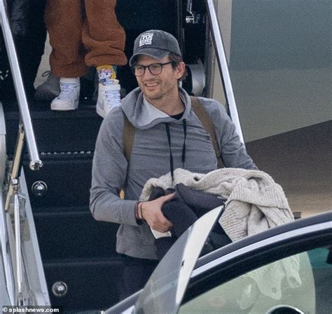 Ashton Kutcher And Wife Mila Kunis Return To Los Angeles With Their