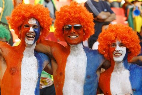 Dutch Fans At The World Cup An Army Of Orange Clowns Touring South