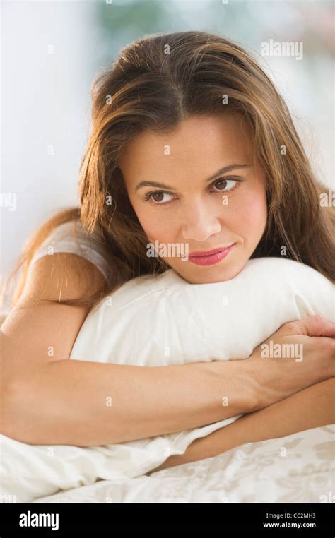 Usa New Jersey Jersey City Woman Lying On Bed Stock Photo Alamy
