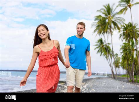 Couple Walking Holding Hands On Beach Holidays Summer Vacation Travel Destination Happy Asian