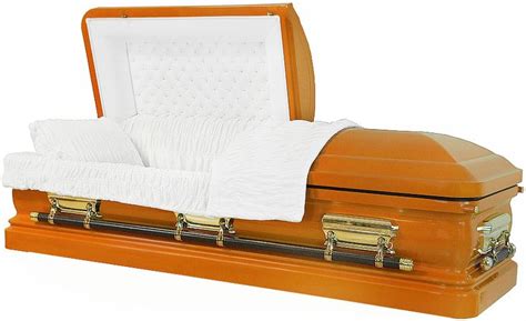 An Orange Casket With Two White Pillows On Top
