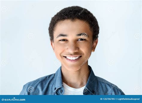Portrait Of Smiling African American Teen Boy Looking At Camera Stock