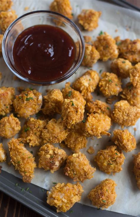Dip the chicken pieces into the egg and then transfer to the plate and coat with the krispie mixture. Baked Popcorn Chicken | Recipe | Baked chicken nuggets ...