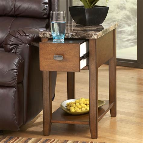 Despite its small size, its top can support up to 100 pounds. Faux Marble Top Chairside End Table Signature Design by ...