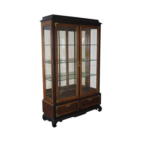Display your collectables with pride in this lighted curio cabinet. Broyhill Premier Asian Style Lighted Curio Display Cabinet ...