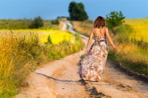 Beautiful White Girl Walking The Road Stock Image Colourbox