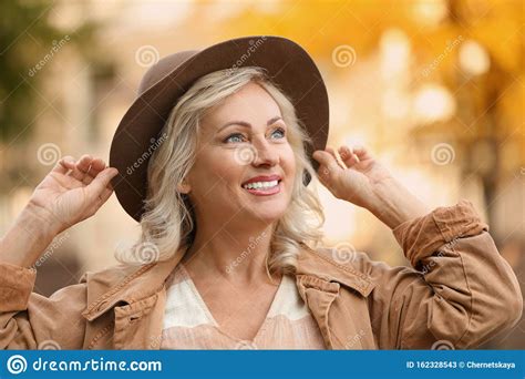 Portrait Of Happy Mature Woman With Hat Stock Image Image Of Mature Fashion 162328543