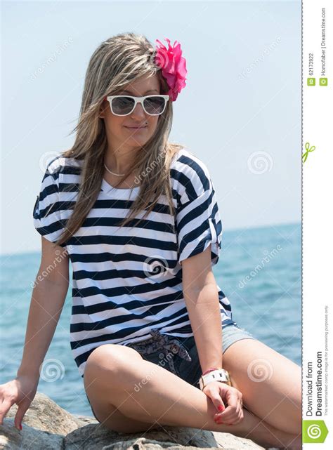 Lady Sitting And Relaxing On Sea Rocks Stock Photo Image Of
