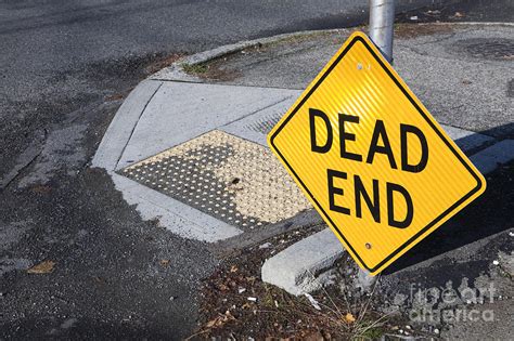 She is disheartened to learn that he is seeing a new girl. Dead End Sign Photograph by Paul Edmondson